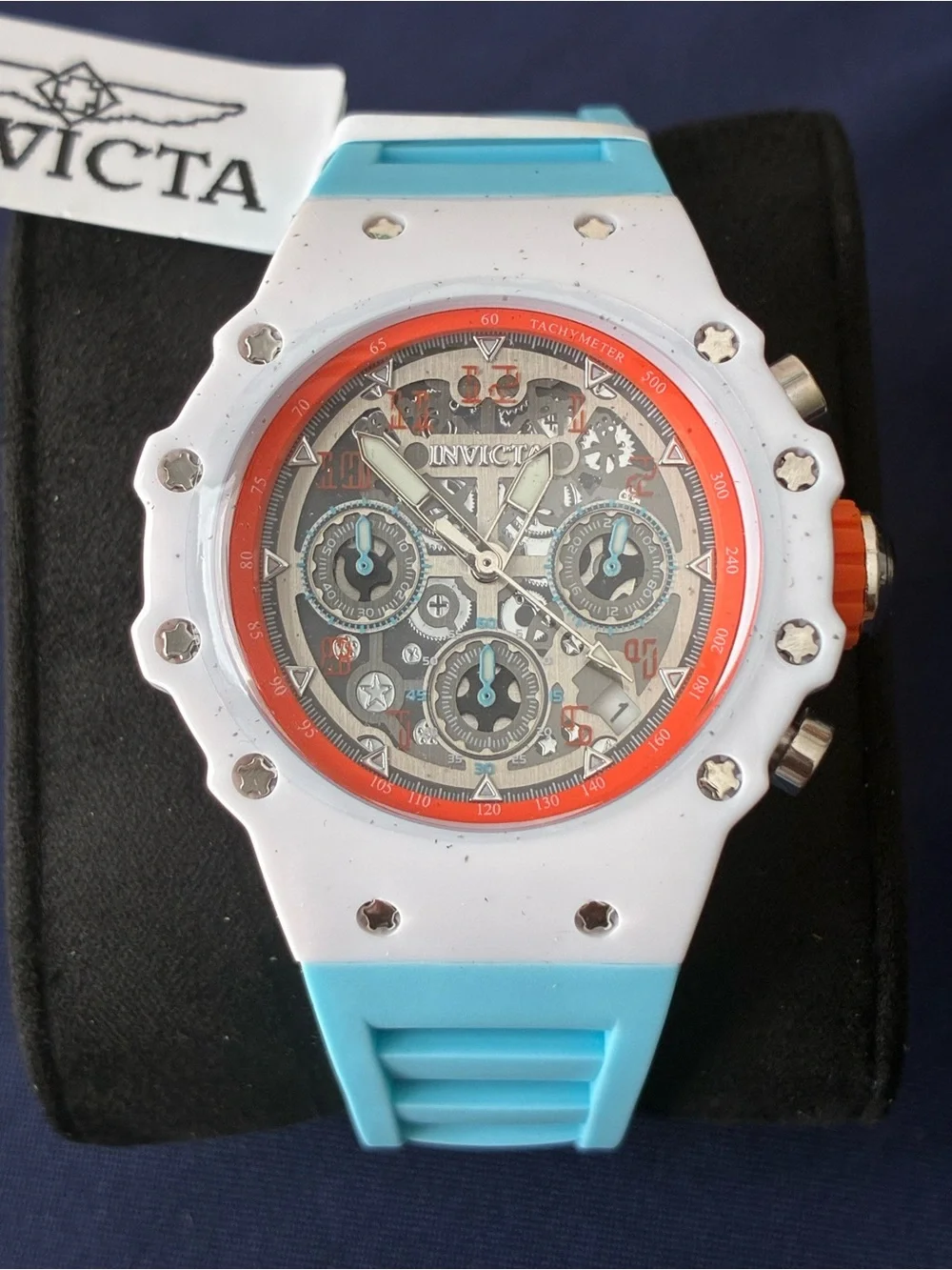 Invicta White Watch with Coral Orange Bezel and Aqua Strap